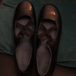 Vionic patent leather black flats.  Elastic front